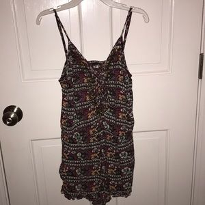 Printed romper, beaded details on front